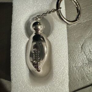 Cosmic Kylie Jenner Bottle Keyring